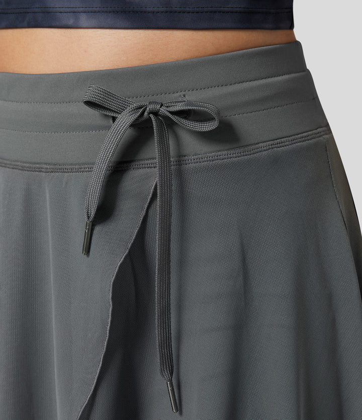 GINNY / DAY-TO-NIGHT MIDI SKIRT